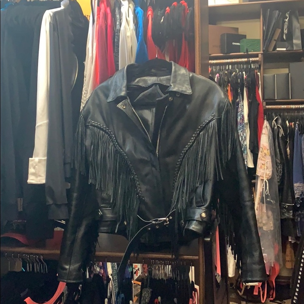 Leather biker fringe jacket size large.
